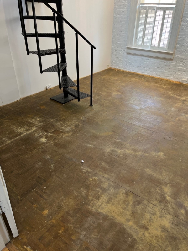 Daum Residence – worn finish with claw and traffic wear – before refinishing