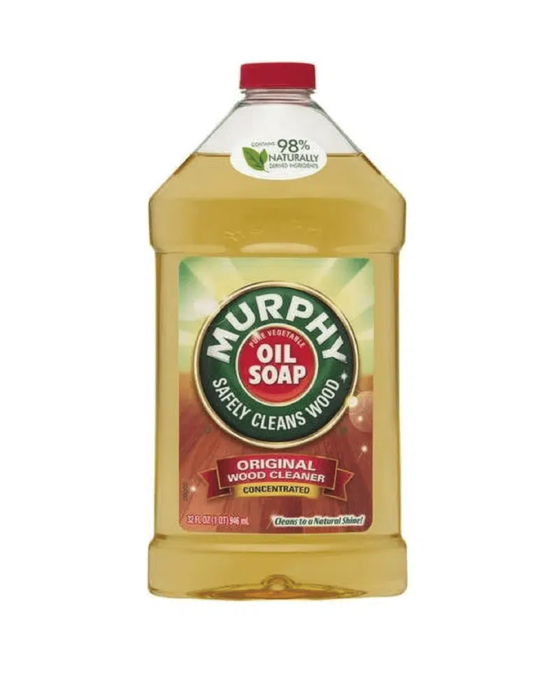 A bottle of Murphy Oil Soap concentrated original wood cleaner stating it "Safely Cleans Wood" and is a pure vegetable oil soap.