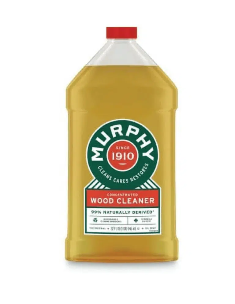 A bottle of Murphy Oil Soap concentrated wood cleaner stating it "Cleans Cares Restores" since 1910 and is 99% naturally derived.