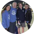 Group photo of satisfied ReCoat Revolution customer, Cheri Rich, and her family.