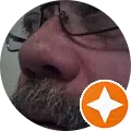 Close-up image of the face of satisfied ReCoat Revolution customer, Kenneth Williams.